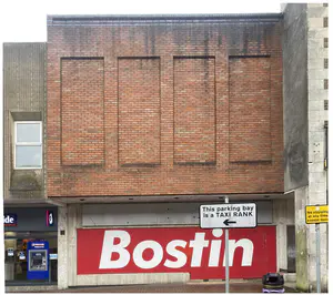There is a clear presence representing Dudley with the bold red ‘Bostin’ sign at ground level. Chosen for its cantilever first and the second floor, this building could be adapted to have an external space. Also, there is a slight ‘hotel Fouquet barrière’ about the facade as its bricked-up windows represent change over time. - Ryan Cooksey Building 3 Photo.png